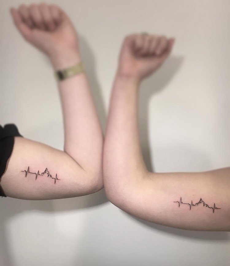 tatuagem-batimento cardíaco-casal-tatuagens-montanhas-aventura-significado