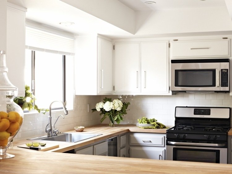 wood-countertops-kitchen-modern-white-tiles-back wall