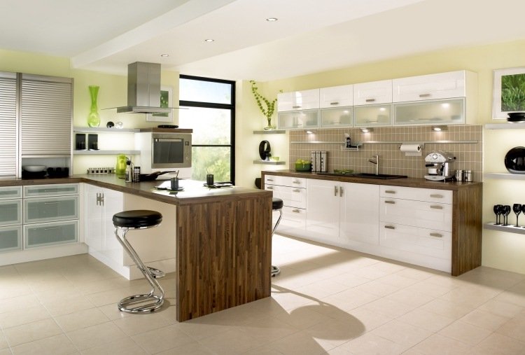 wood-countertops-kitchen-modern-dark-solid wood-peninsula-pastel-green-wall-paint