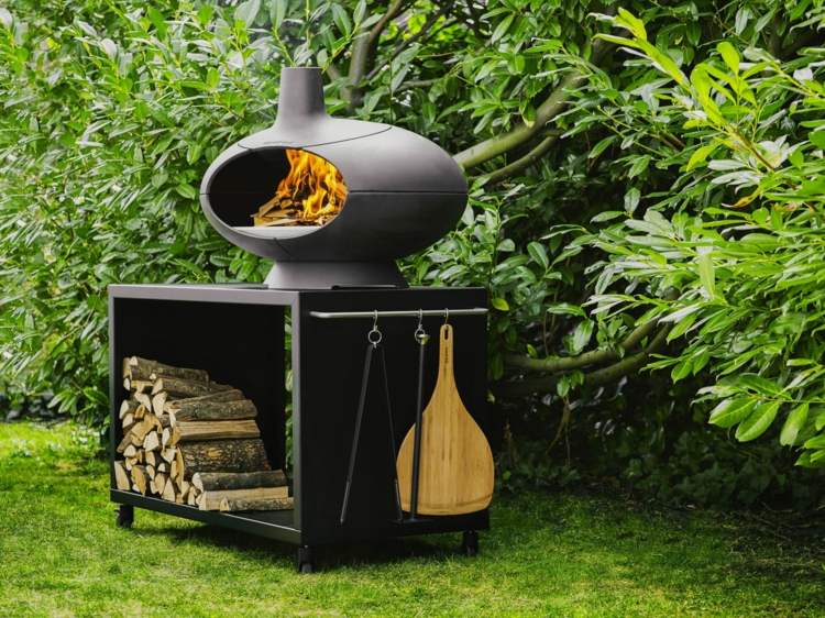 forno a lenha no jardim forno de pizza-vagão-toras-espaço de armazenamento