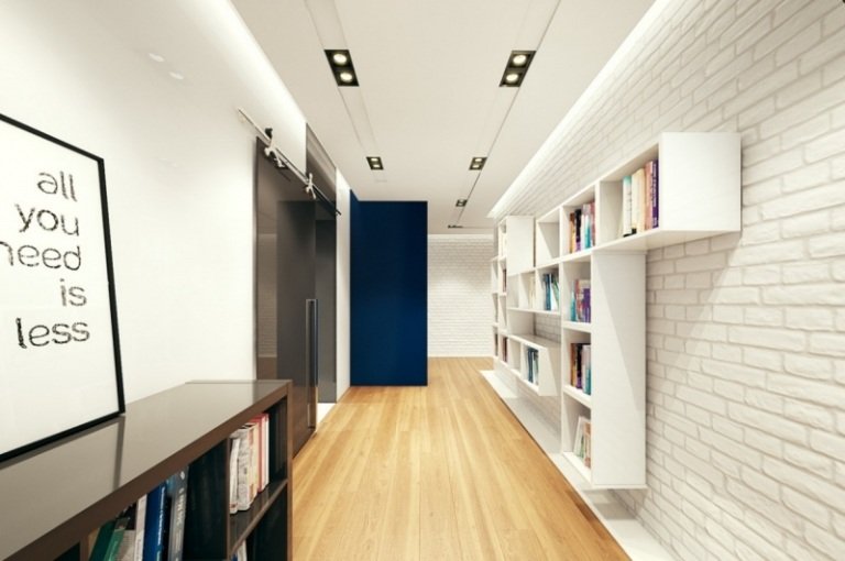 iluminação indireta-led-corredor-teto suspenso-teto-parede de tijolos brancos