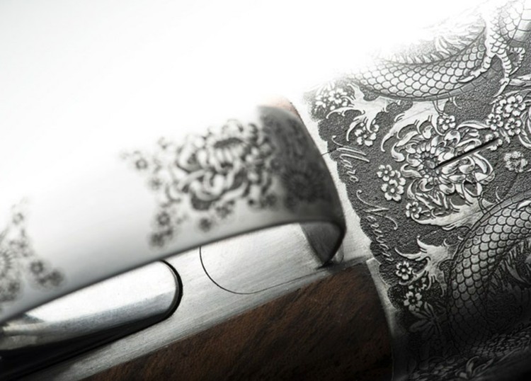 Design de rifle newson com letras de metal gravado