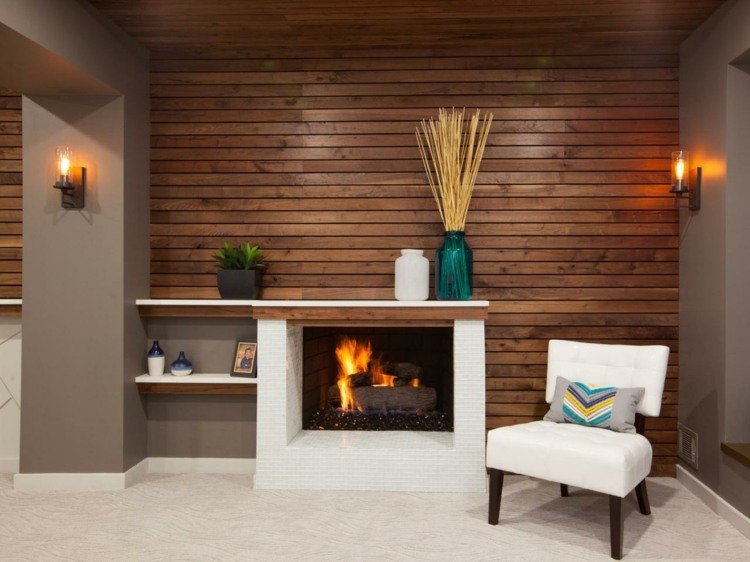 Converta o porão em um espaço de estar para convidados-relax-lareira-revestimento de parede de madeira