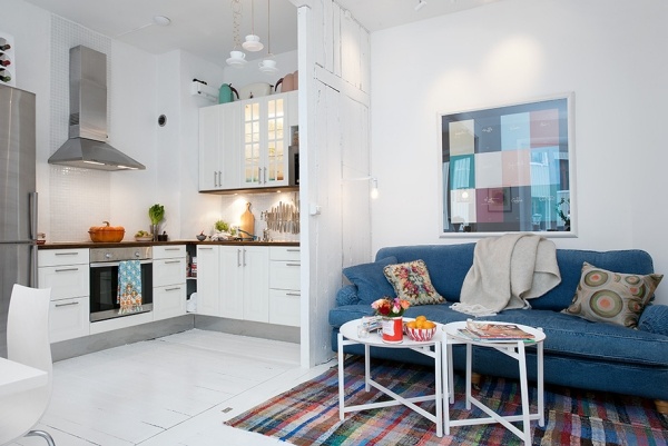 Cozinha divisória azul sofá apartamento loft