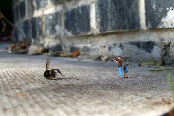 Fotografe o design em miniatura da arte fly-street