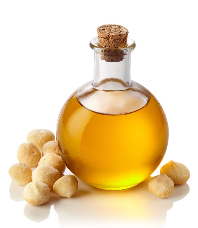 use óleo de macadâmia para fritar nozes de macadâmia redondas de vidro