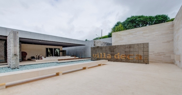 minimalista-concreto-villa-pátio-lagoa-fonte-design