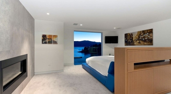 casa de campo luxuosa lareira quarto branco azul