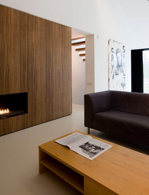 sala de estar minimalista com lareira moderna