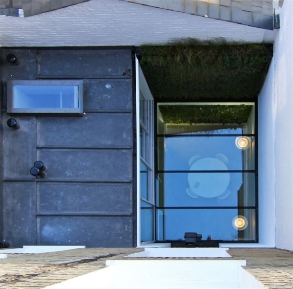 reforma de casa, porão, telhado de vidro, esverdeamento da parede vertical