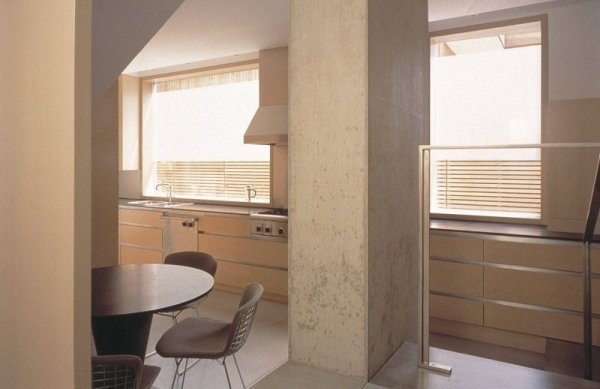 Cozinha com decoração simples - casa de concreto Shaw