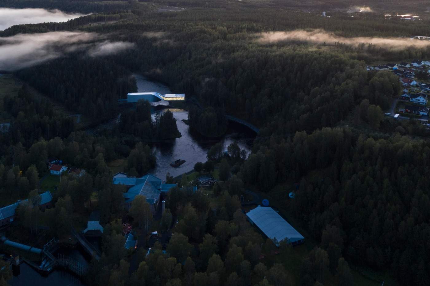 bjarke ingels arquiteto a ponte do museu de torção de uma vista aérea