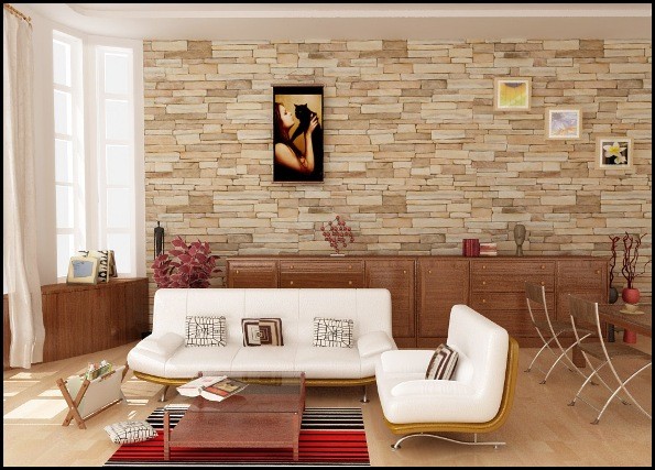 Parede de pedra natural na sala de estar com móveis brancos