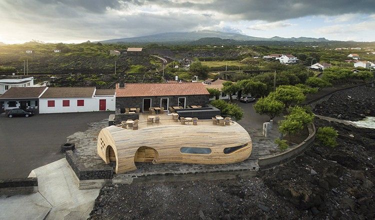 orgânica-arquitetura-extensão-revestimento de madeira-fachada-terraço na cobertura