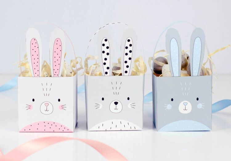 Faça uma cesta de Páscoa de papel com coelhos como motivo em três cores