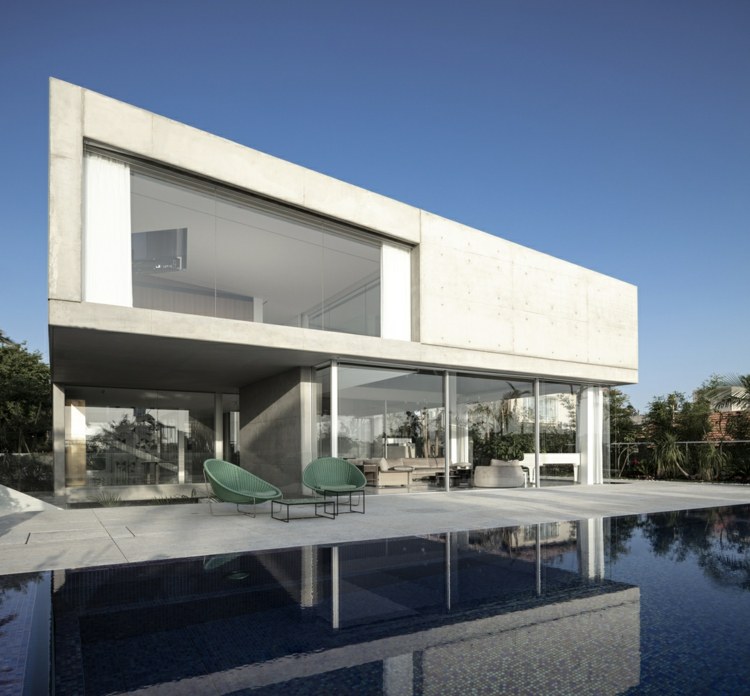 casa unifamiliar de dois andares piscina de concreto exposto piscina d3 casa israel