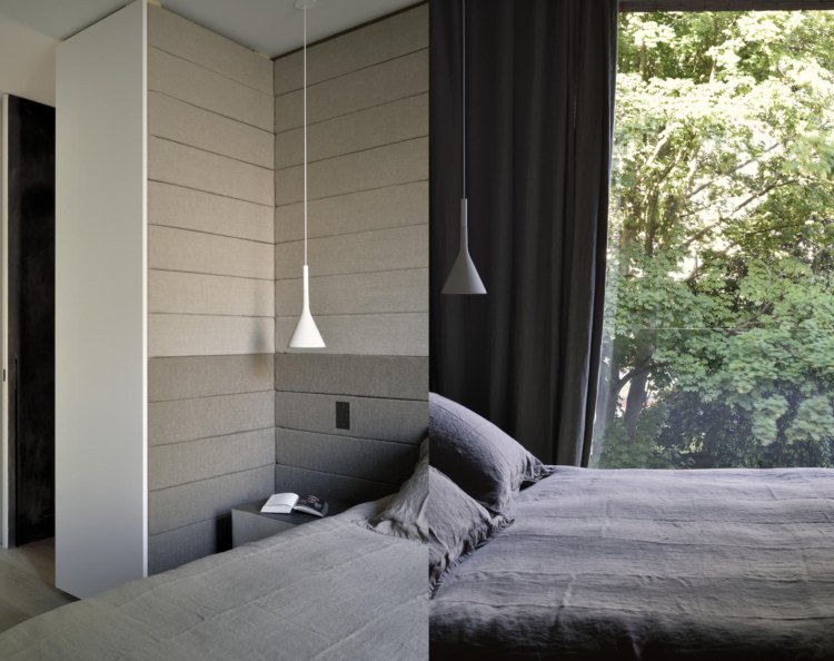 parede estofada com cama de casal em cor antracite