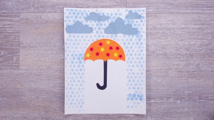Faça um guarda-chuva e crie uma imagem com gotas de chuva feitas de plástico-bolha