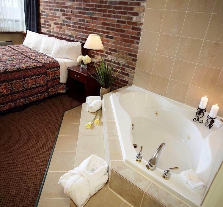 quarto-whirlpool-jacuzzi-bricked-input-corner-bed-brick-wall-white-beg-tiles