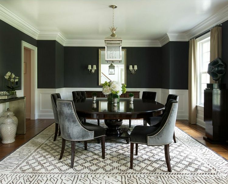 sala de jantar moderna com mesa redonda em carpete preto