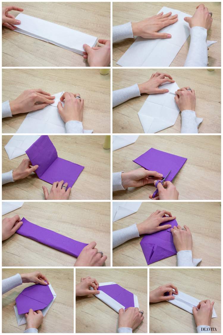 orelhas de coelho de duas cores dobram-se em um guardanapo branco e roxo