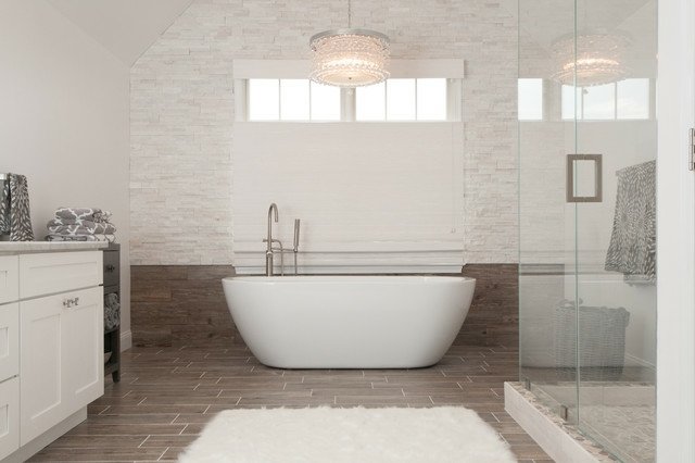 Cabine de duche com parede de vidro e pedra natural