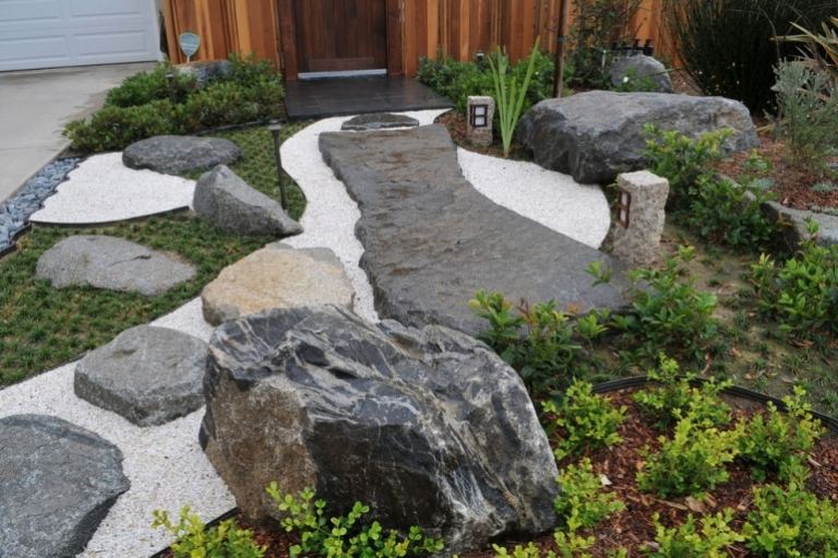 Rock-garden-create-garden-path-rock-ornamental-cascalho-flat-stones
