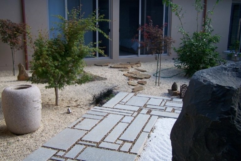 Rock jardim-lay-paving-stones-cascalho-rock vulcânico