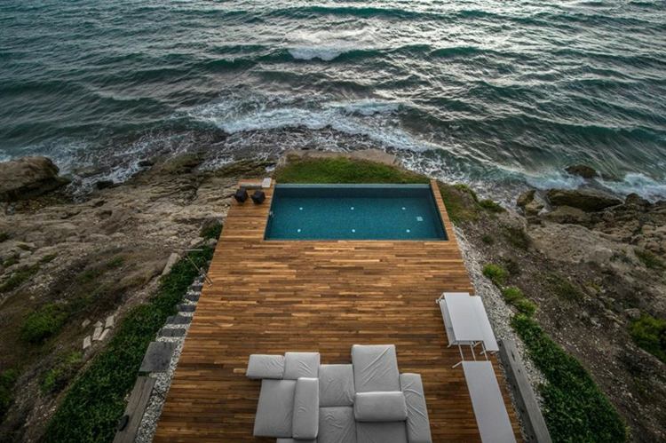 casa de praia estilo mediterrâneo piscina em parquet mar infinito salão de praia