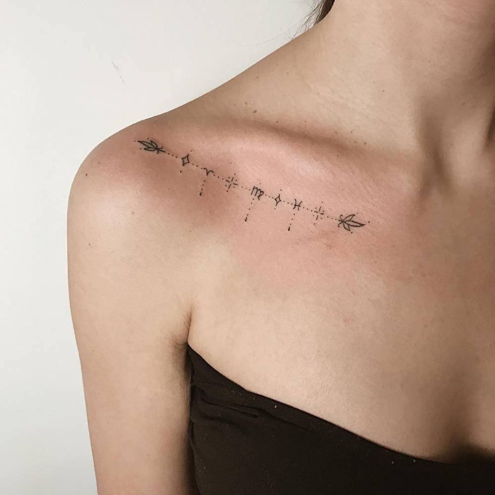 Design de tatuagem de seta que significa pequenas tatuagens para mulheres