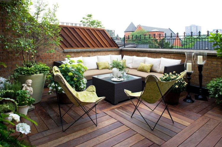 terraço e varanda design moderno cadeiras de vime têxtil verde piso de madeira
