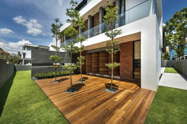 Terraço de madeira com fachada moderna e belo design