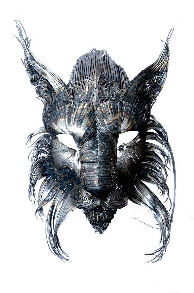 esculturas de animais feitas de metal lince cabeça cinza