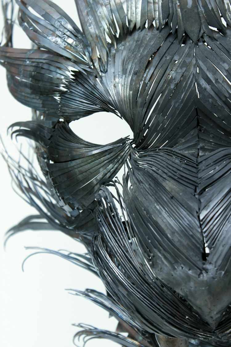 esculturas de animais metal preto marca olho de tigre tiras de metal