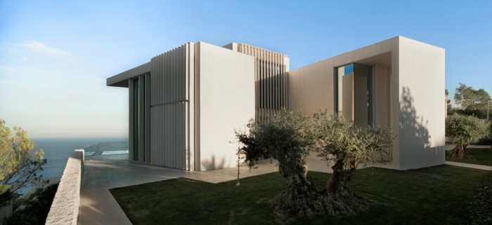 ideia de projeto de construção de casa de concreto branco moderno