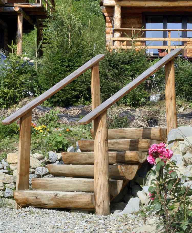 escada de madeira para jardim construir troncos cortados pela metade