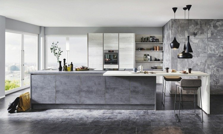 Móveis minimalistas imitam pedra natural e concreto na cozinha