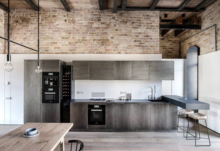O tijolo é um ótimo pano de fundo para a cozinha de aparência de concreto