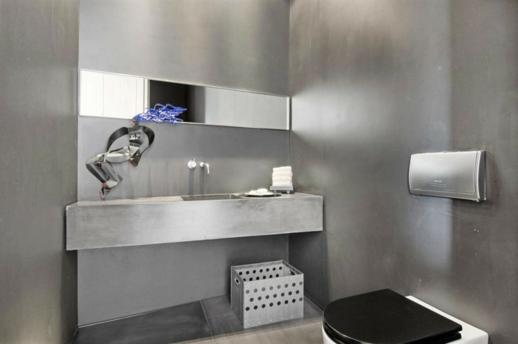 banheiro vila à beira-mar pia de concreto cinza