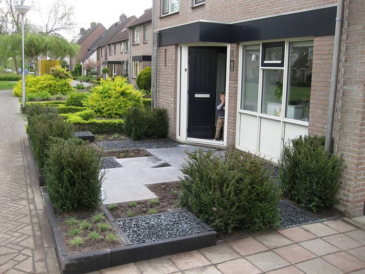 Crie jardins frontais fáceis de cuidar-arbustos-concreto-lajes-cinza-cascalho