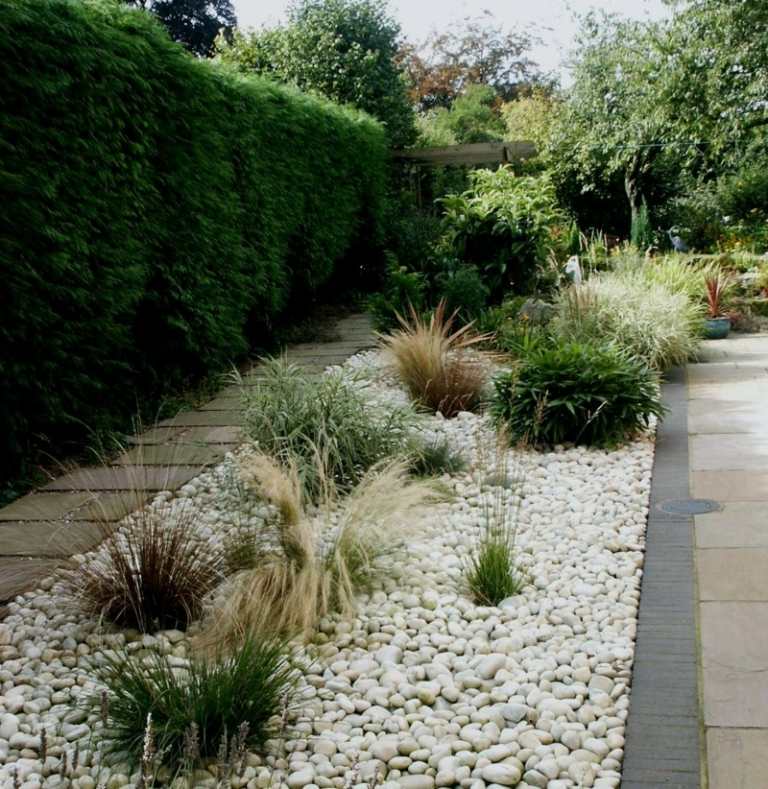 Projeto do jardim frontal com cascalho acessório decorativo de pedras brancas graeser