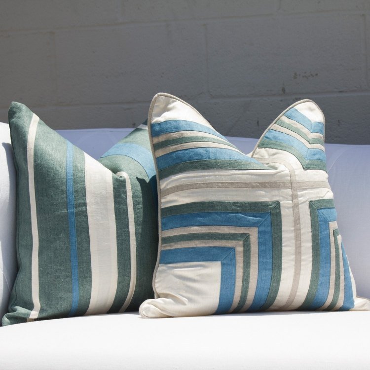 parede-cor-cinza-combinações-travesseiros-branco-azul-verde-cores pastel-pequenos têxteis para casa