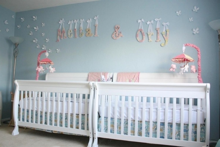 wall-color-mint-green-baby-room-twins-baby-bed-white-mobile-lamp