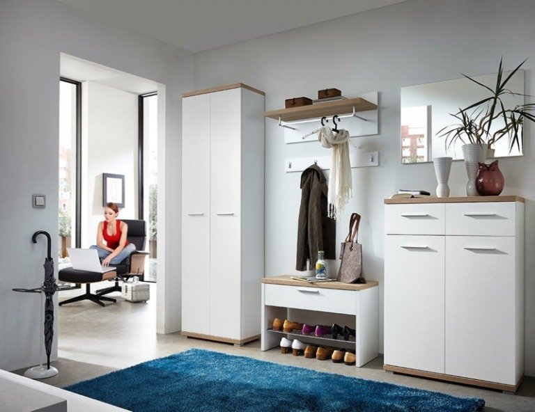 guarda-roupa design mobiliário branco sapateira interior tapete azul
