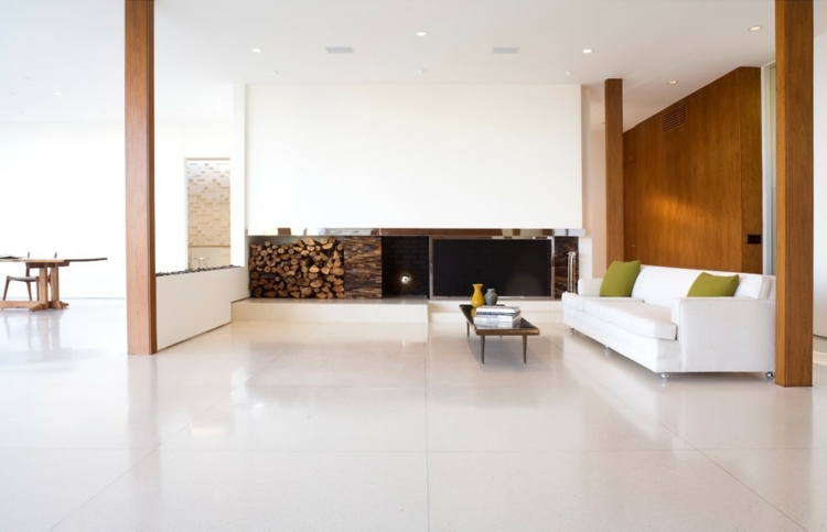 parede-concreto-bloco-sala-lareira-sofá-viga-branca-decoração a lenha