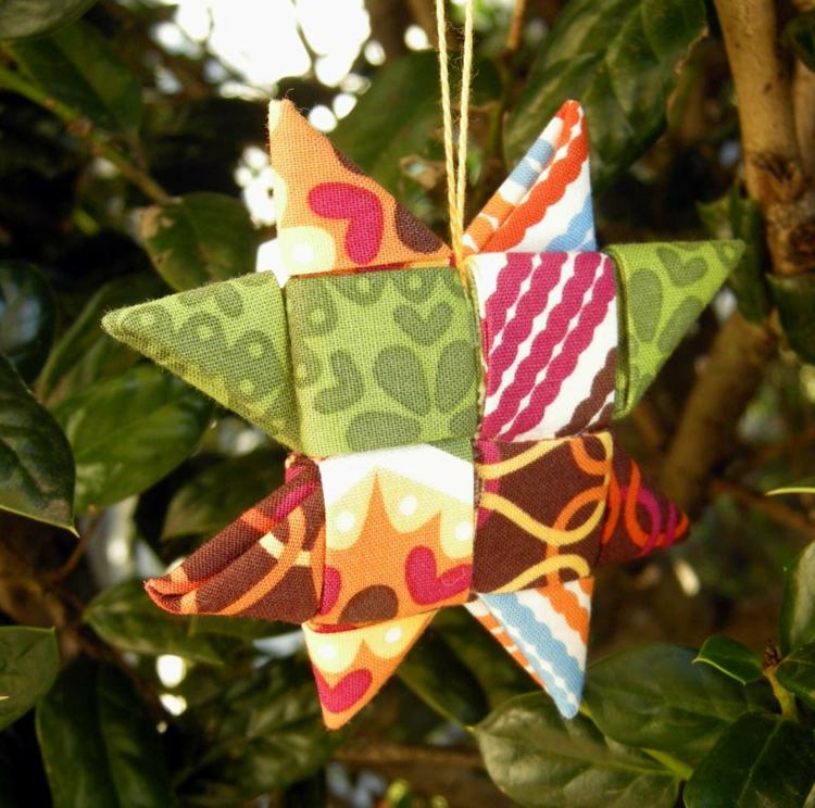 faça seu próprio tecido de decoração de natal instruções coloridas de dobra em estrela