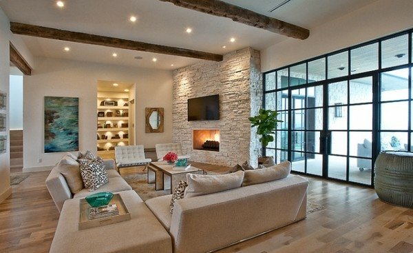sala de estar moderna estilo country sofá rústico bege com luzes de teto parede de pedra